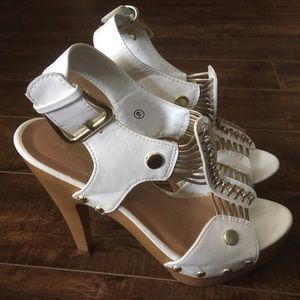 White high heel sandals with gold details